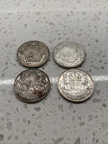 Lot Of 4 1945 Canada Half Dollars - VF to UNC Condtion 80% Silver Coins