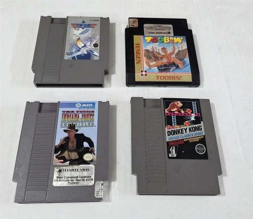 T-124 VINTAGE NINTENDO NES LOT TOP GUN, TOOBIN, DONKEY KONG, INDIANA JONES