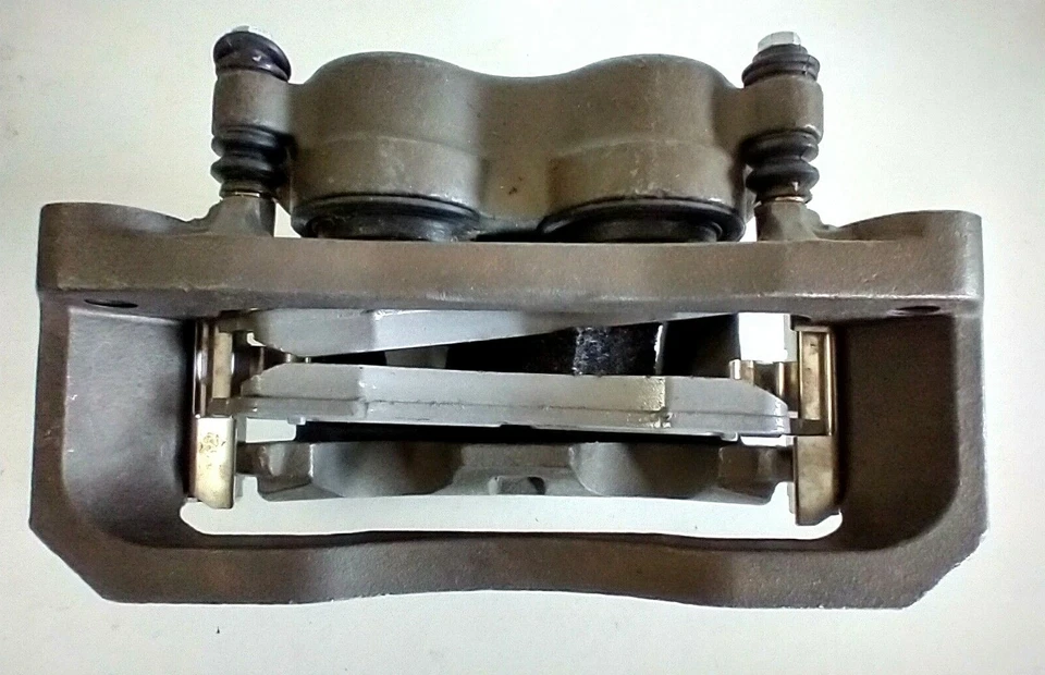 Pinza de freno de disco delantera derecha cargada con pastillas de freno WAGNER TQM25009 Reman Foto 2 de 4