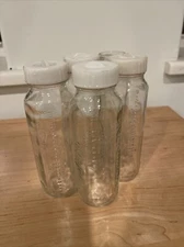 Vtg  Lot 5 Evenflo  Clear  Glass  Baby Bottle 4 Tops