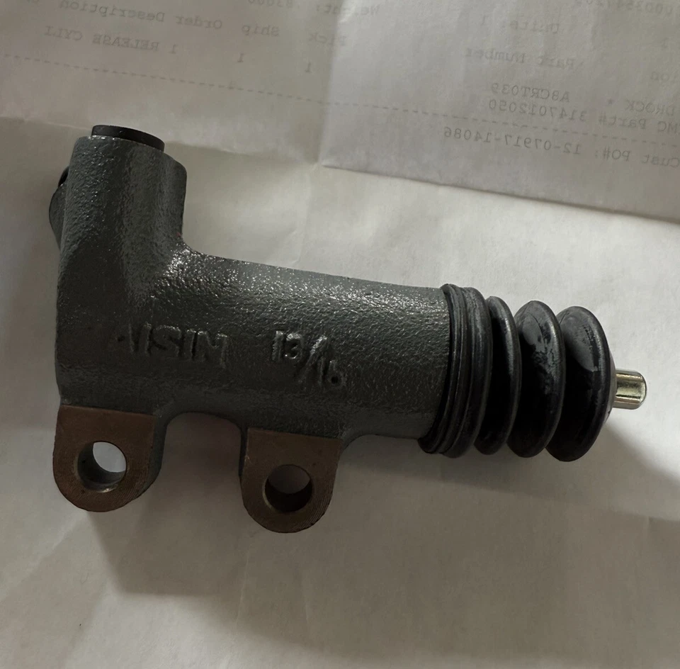 Cilindro esclavo embrague-eng Código: 4AC Aisin CRT-039 se adapta a Toyota Corolla 1985 Foto 2 de 4