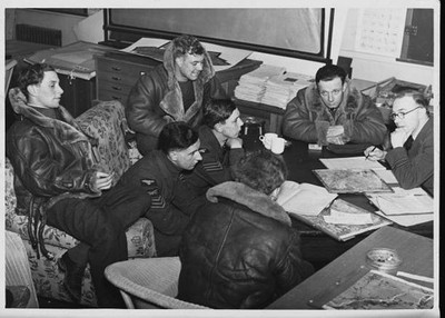 Royal Air Force bomber pilots attending a briefing after their ret- Old Photo