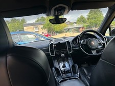 Porsche Cayenne , 2014 , 124,000 miles , Gleaming black bodywork .