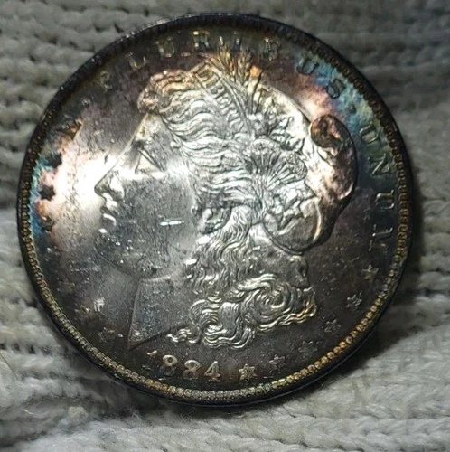 1884-o Morgan Silver Dollar Brilliant Uncirculated Peripherial Toned