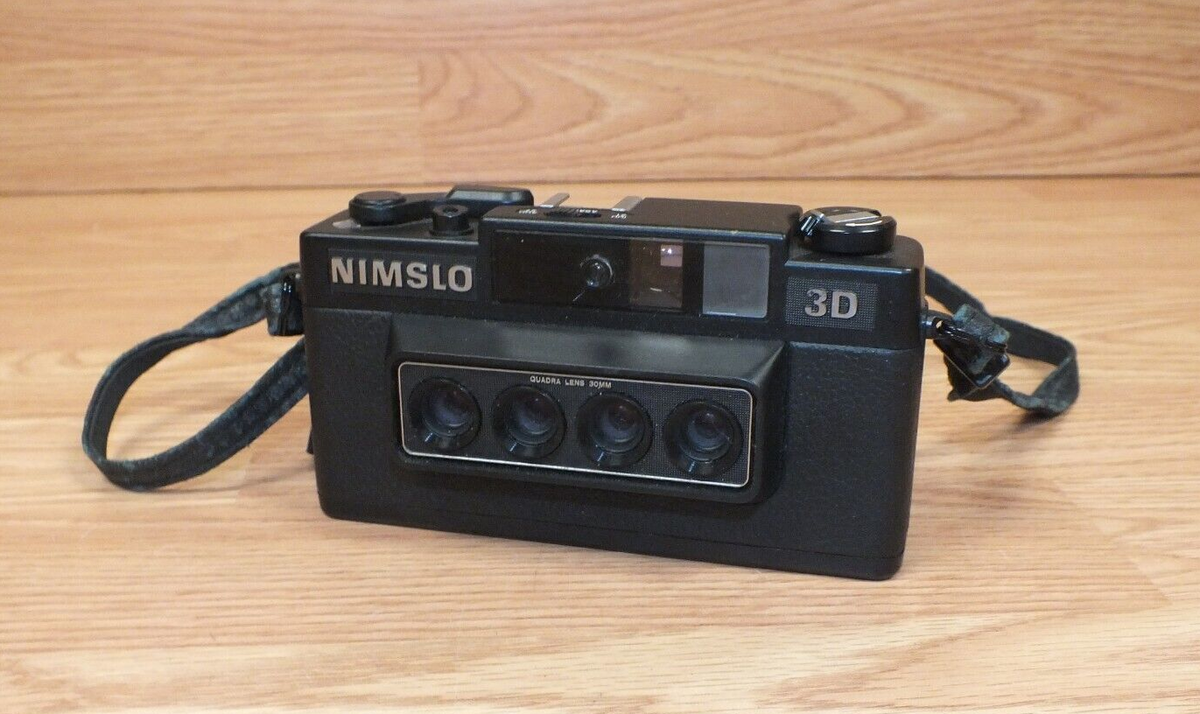 Genuine Vintage Nimslo 3D 35mm Collectible Camera With Strap Genuine Vintage Nimslo 3D 35mm Collectible Camera With Strap