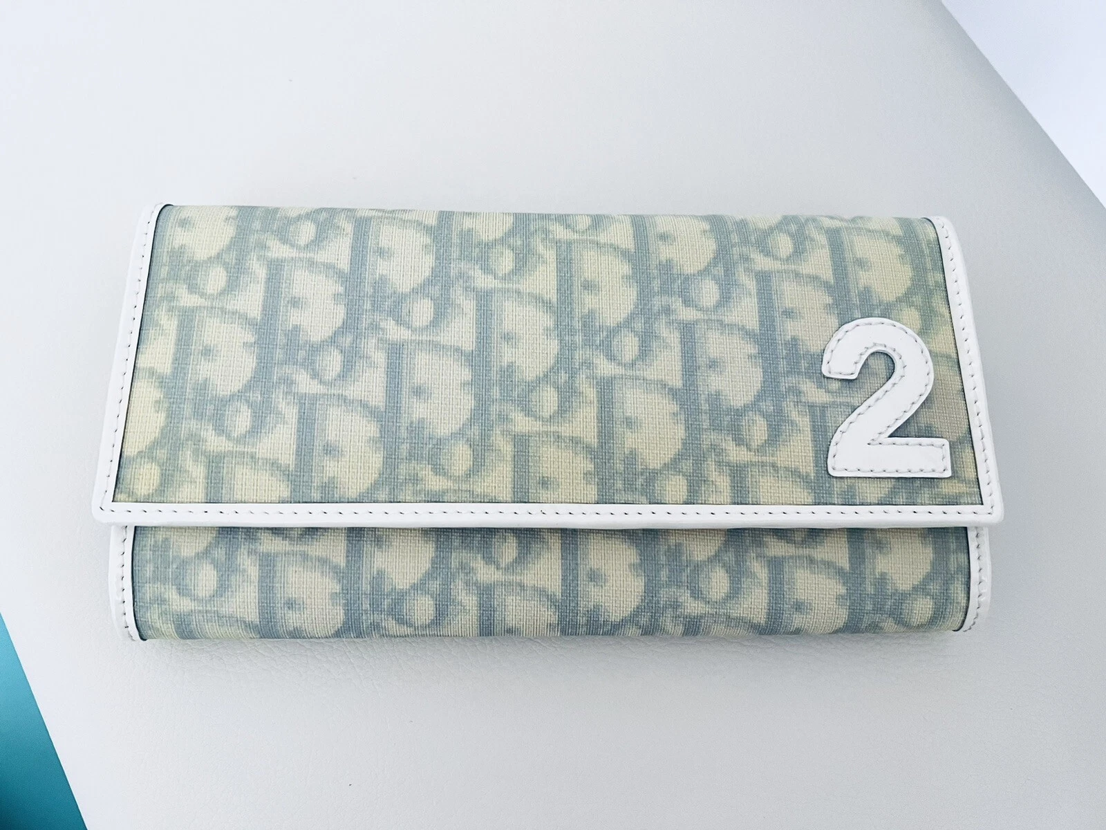 Portefeuille authentique neuf avec étiquettes logo Christian Dior trotteur oblique bébé bleu