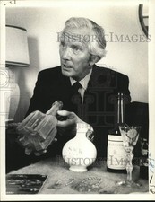 1974 Press Photo Michael Hobbs shows off antique items in New York - tub04085