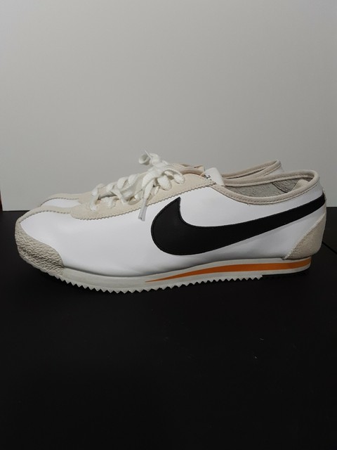 nike cortez orange and black