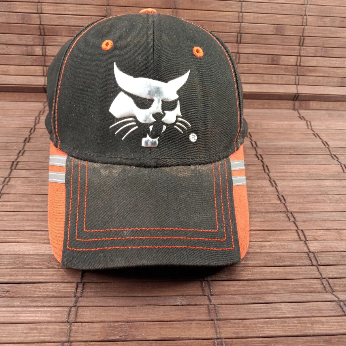 Bobcat Liquid Metal Black Orange Hat Baseball Cap 250296