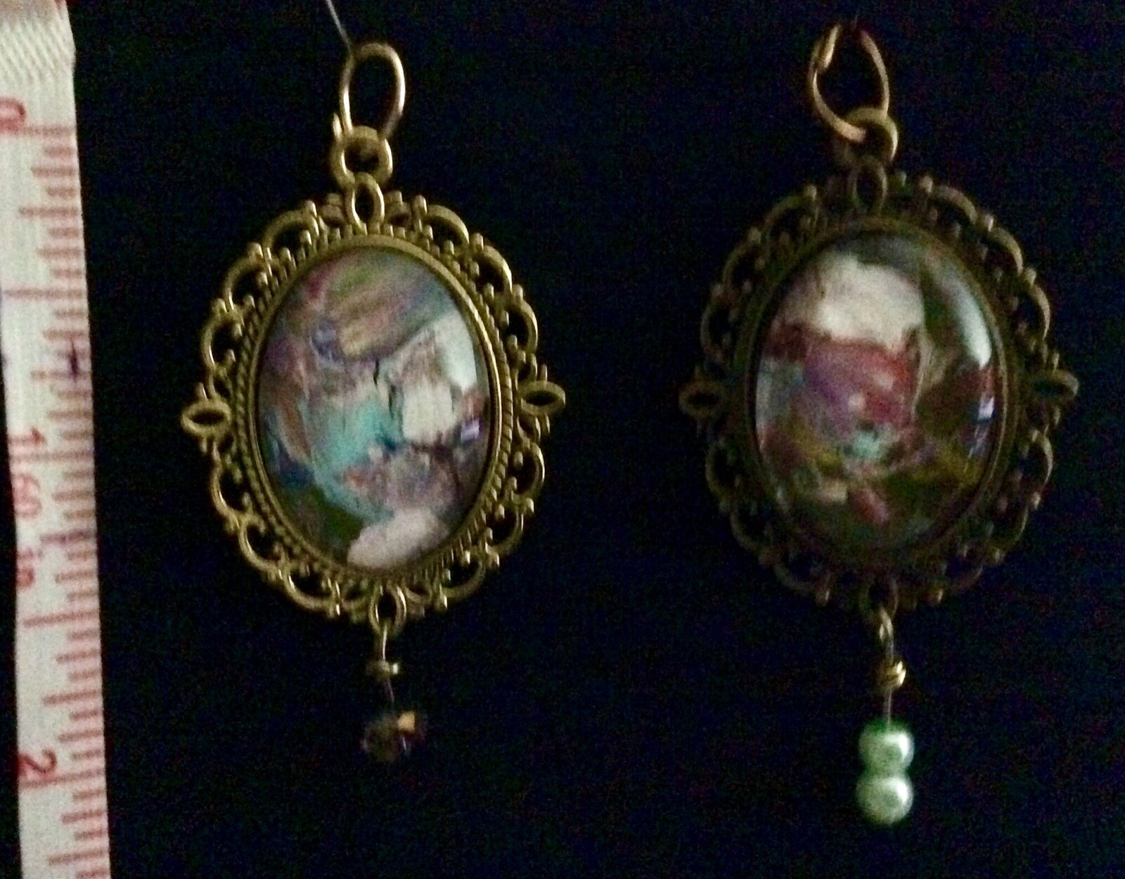 2 wearable art pendants antique finish gold & brass blue,purple,pink