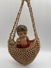 Vintage Celluloid Kewpie Carnival Doll in Mesh Covered Heart Pillow