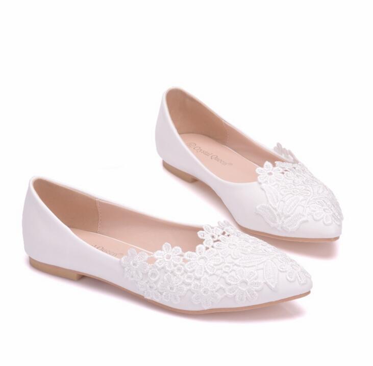 white pointed loafers