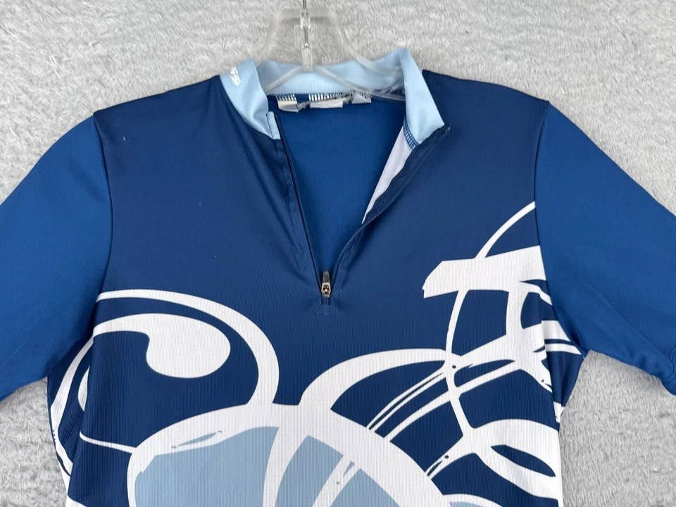 Camiseta de ciclismo Sugoi para niñas extra grande azul 1/4 cremallera manga corta 100 % poliéster Foto 4 de 4