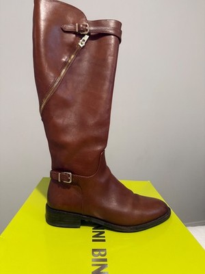 Rich brown leather over-the-knee boots by Gianni Bini. Side zipper