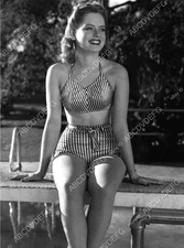 8b20-3668 just lovely Alexis Smith striped swimsuit sitting on diving board 8b20
