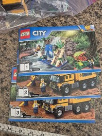 Lego City Jungle Mobile Lab 60160 mostly complete LEGO set with instructions