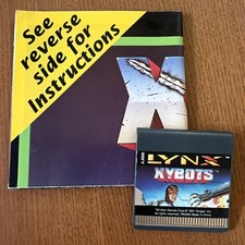XYBOTS FOR ATARI LYNX, CARTRIDGE AND POSTER/MANUAL, NO BOX. TESTED image