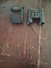 10×25 tasco binoculars in working condition black coloring