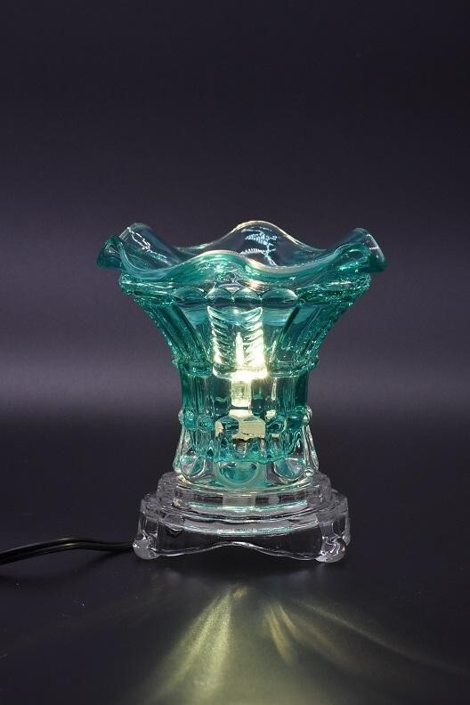 Teal electric wax and oil warmer for home fragrance and aromatherapy-image