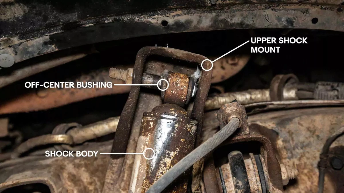 Upper shock mount with bushing slid to one side.