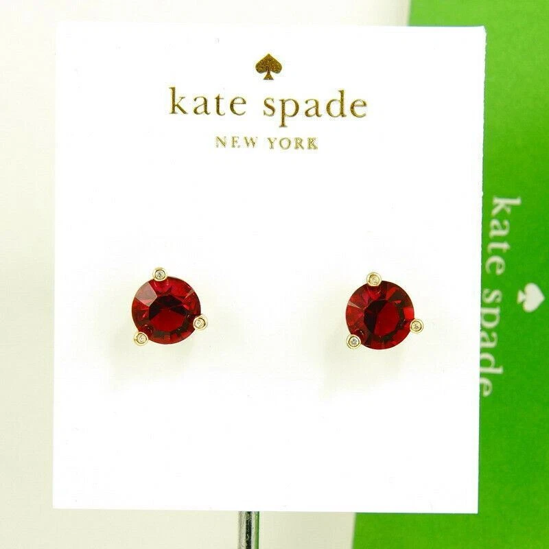 Orecchino Kate Spade Rise and Shine rotondo simulato rosso rubino borchie placcato oro nuovo con etichette