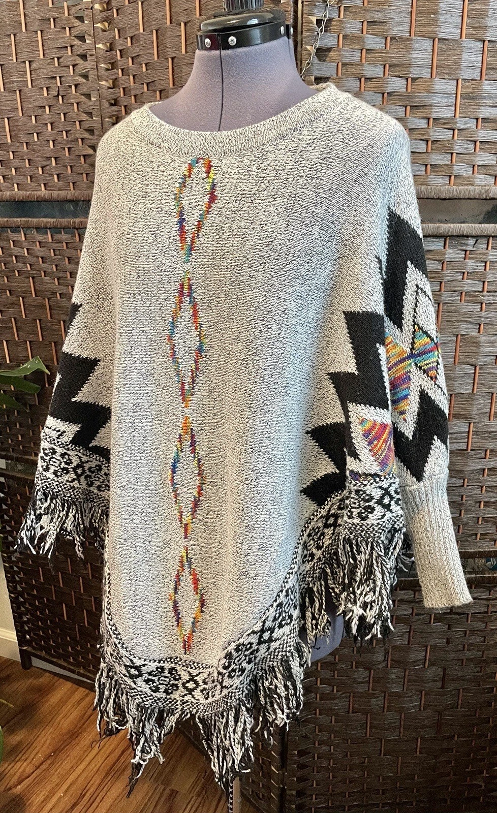 Thick knit poncho fringe tassels Southwestern Aztec rainbow black white pull on