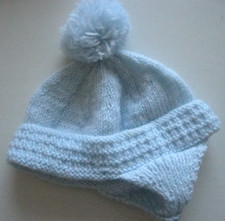 Brand New Blue Hand Knitted Boys Bonnet / Pompom. Size Small. Age 0 - 3 months.