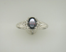 7 x 5 mm Oval Mozambique Garnet Filigree Solitaire Sterling Silver Ring