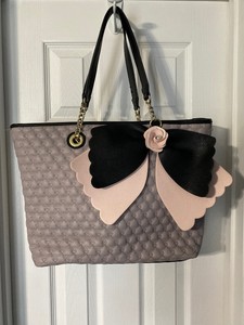 black purse with bow