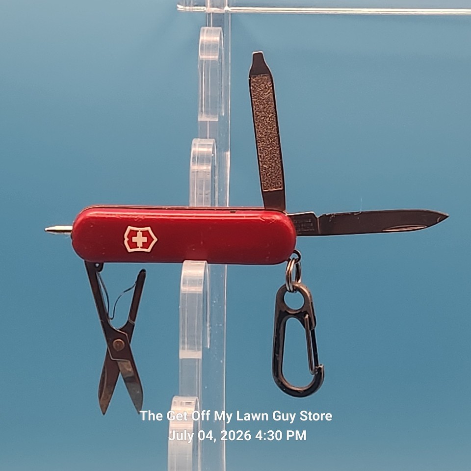 A genuine Victorinox Swiss Army knife with a built-in LED and ballpoint pen squeezed into 58mm — the classiest little multitool money can buy.