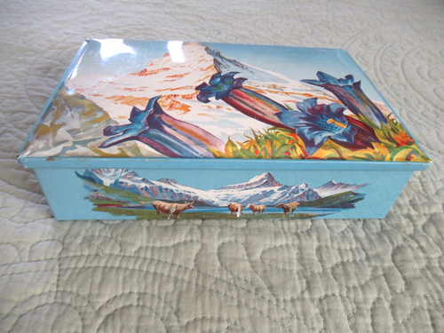 Caja litográfica de hojalata Tobler de chocolate vintage ~ Berna Suiza ~ Campanas azules del Cervino - Imagen 2 de 9