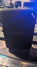 ZyXel P-660HN -51 Wi-Fi 4 IEEE 802.11n ADSL2 Modem/Wireless Router