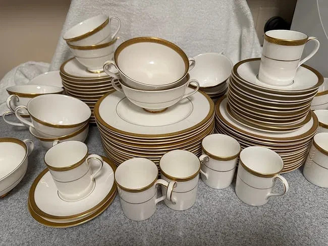 Royal Doulton "Royal Gold" dinnerware, plates, cups, serveware