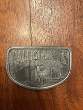 Vintage Raleigh Lights cigarettes, featuring a semi-truck Belt Buckle 8
