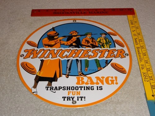 VINTAGE WINCHESTER WOMAN & MEN SHOOTING GUNS 11 3/4" PORCELAIN METAL BULLET SIGN