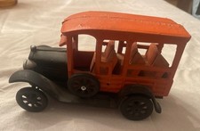 Cast iron toy taxi cab model, likely based on a 1920s Ford Model T