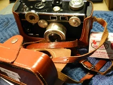 Argus C3 35mm Colormtic Rangefinder  Camera W/Case, and roll of film  IT  WORKS