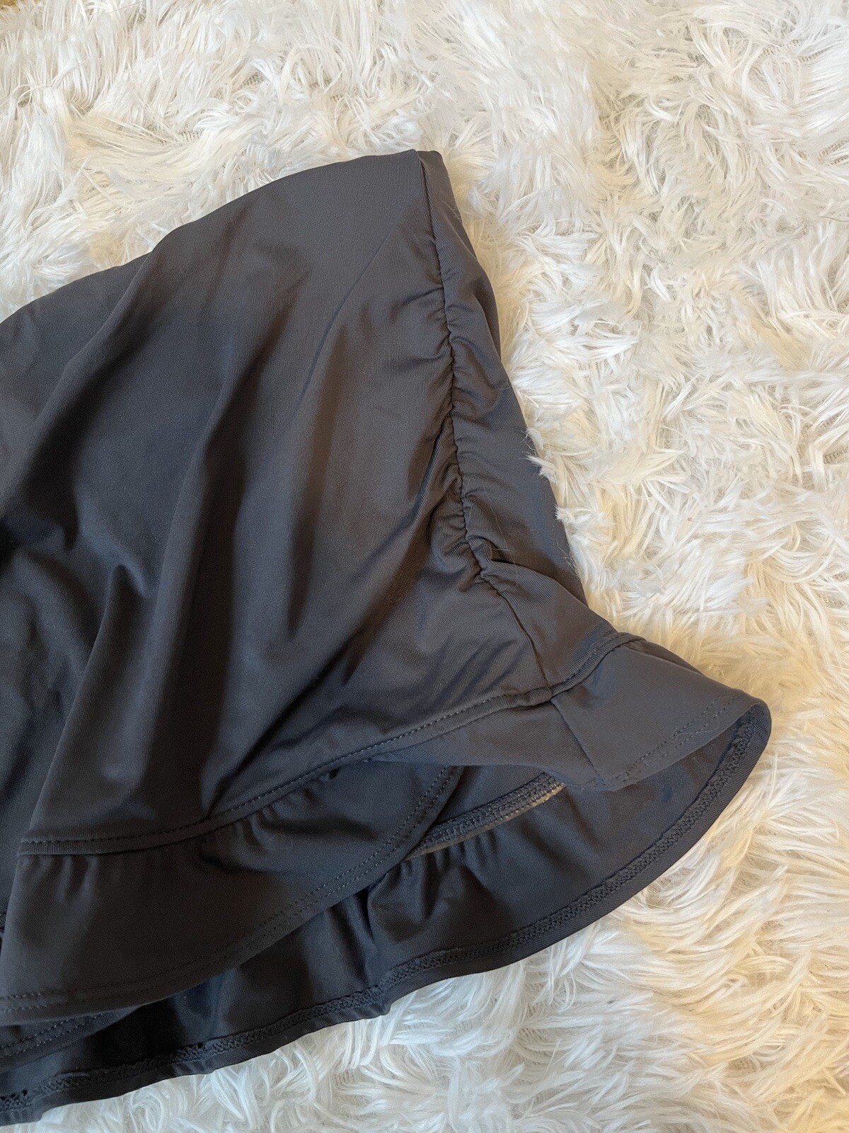 Athleta grey swim bottom skort with ruffle size medium Gem