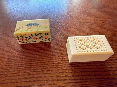 Two unknown vintage small plastic or stone jewelry boxes with lids