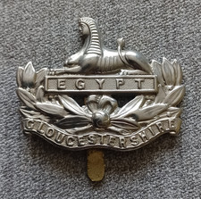 BRITISH ARMY BADGE - GLOUCESTERSHIRE REGIMENT EGYPT.   VERY GOOD CONDITION.