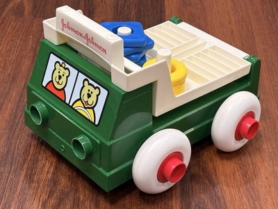 Vintage 1983 Johnson & Johnson Stack & Dump Truck w 8 Shapes Made In USA