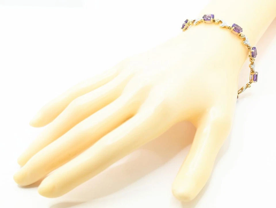 Brazalete Tenis 7.25" 10k Oro Sólido 2 Tonos Amatista Alterna y Onda Diamante Foto 2 de 4