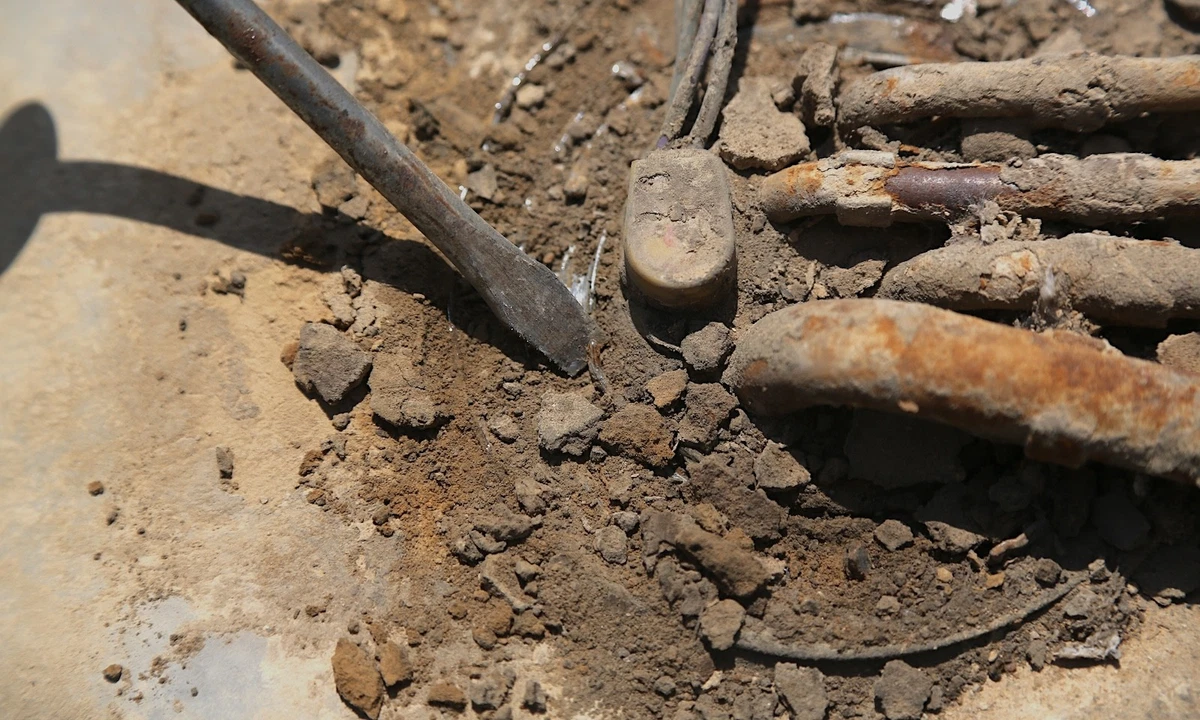 Retainer buried in dirt