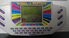 Wheel Of Fortune Handheld Electronic Game By Tiger