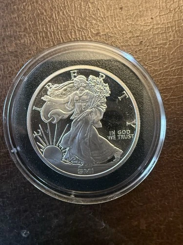 1 Ounce .999 Fine Silver Silver Round Walking Liberty SMI Plastic Holder 2