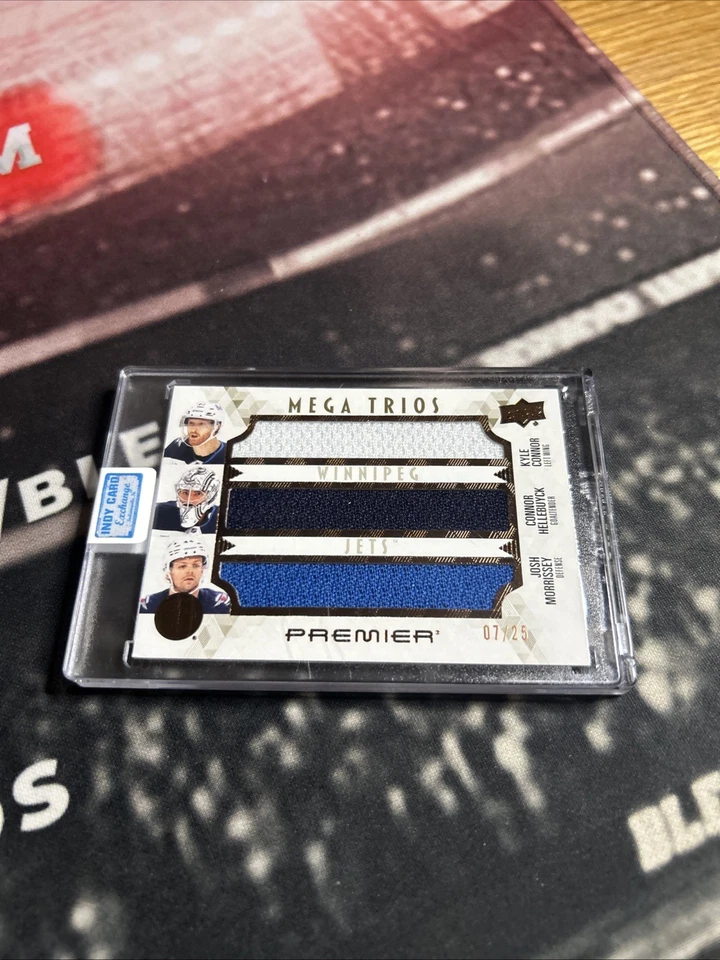 2024-25 Premier Mega Trios Kyle Connor, Connor Hellebuyck, Josh Morrissey /25 - Image 2 of 4