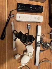 Nintendo Wii video game system console w/ sensor bar, stand, controllers, cables