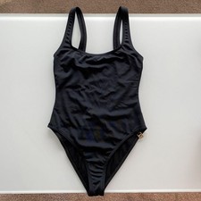 Costume intero Gucci nero aperto dietro con ciondolo oro donna taglia S usato