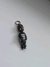 WWI Fumsup Charm English Good Luck Wood Head Tiny Silver Body Glass Eyes