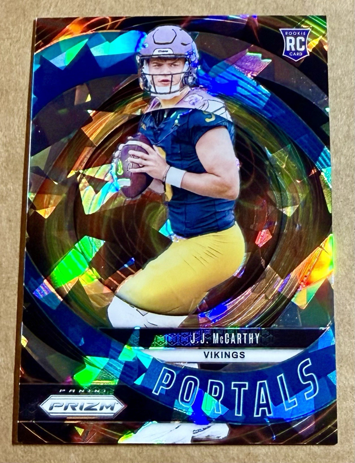 J.J. McCarthy 2024 Panini Prizm Portals BLUE ICE PRIZM /99 Vikings RC #7 Insert